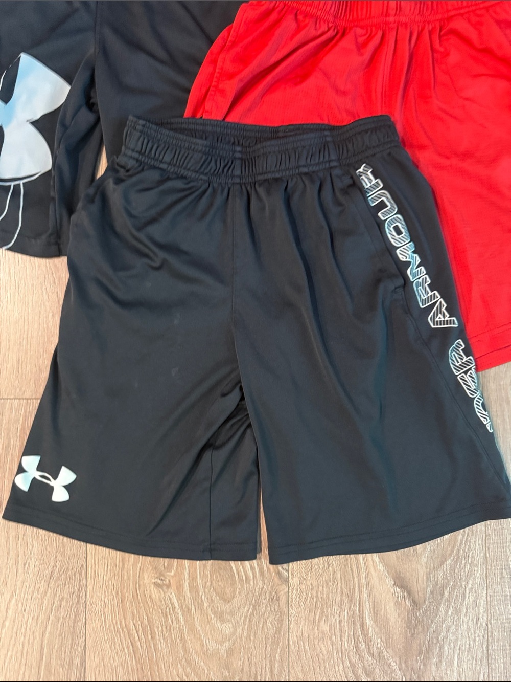((3 PIECE)) NIKE AND UNDER ARMOUR BOYS SHORTS BUNDLE SIZE MEDIUM RED AND BLACK - Picture 2 of 4